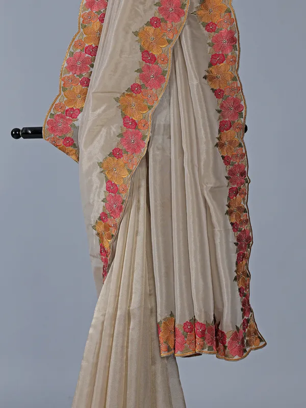 Off white tissue silk stone embroidered saree