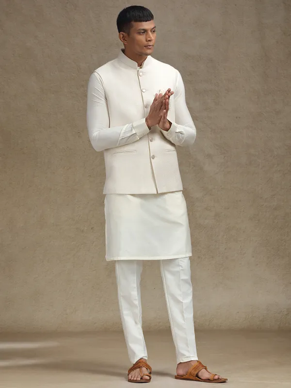 Off white waistcoat set with intricate work