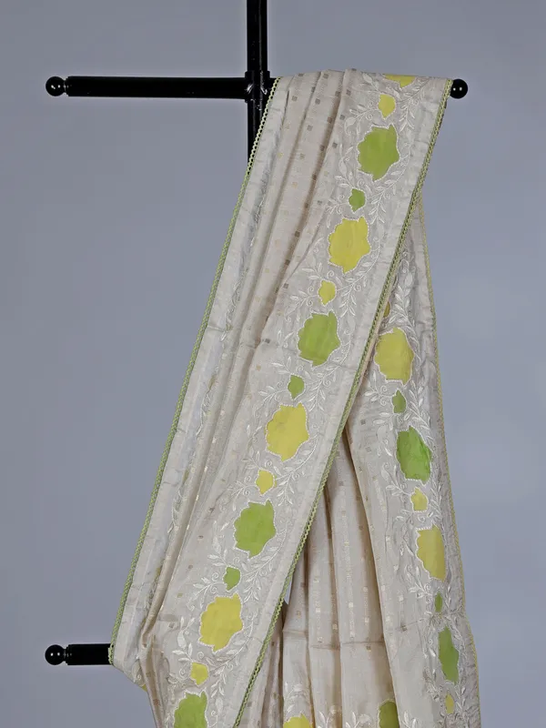 Off white yellow semi silk saree with zari design