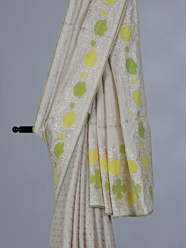 Off white yellow semi silk saree with zari design