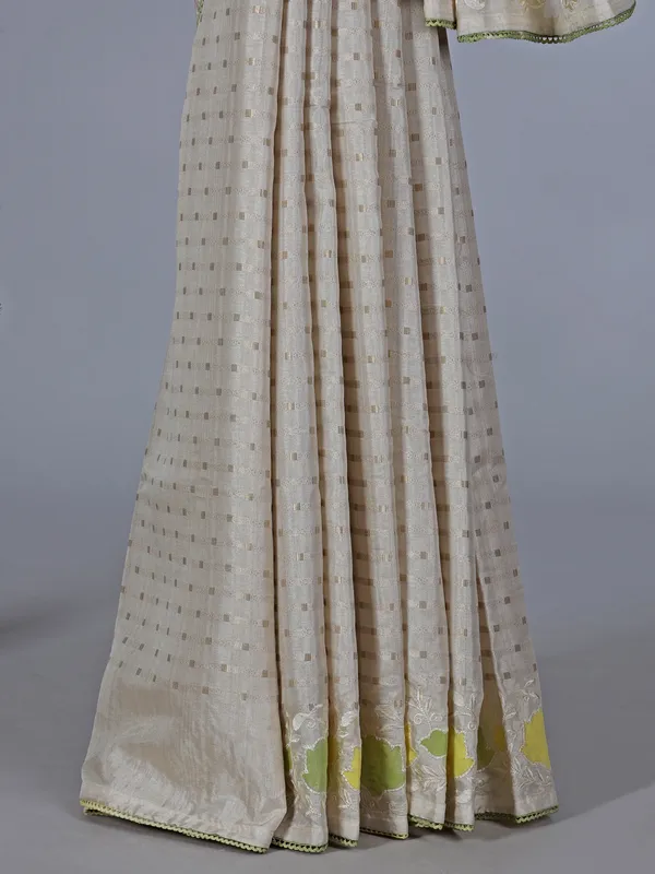 Off white yellow semi silk saree with zari design