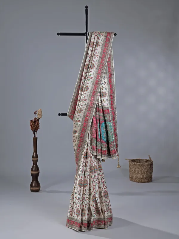 Off white zari weaving wedding wear saree