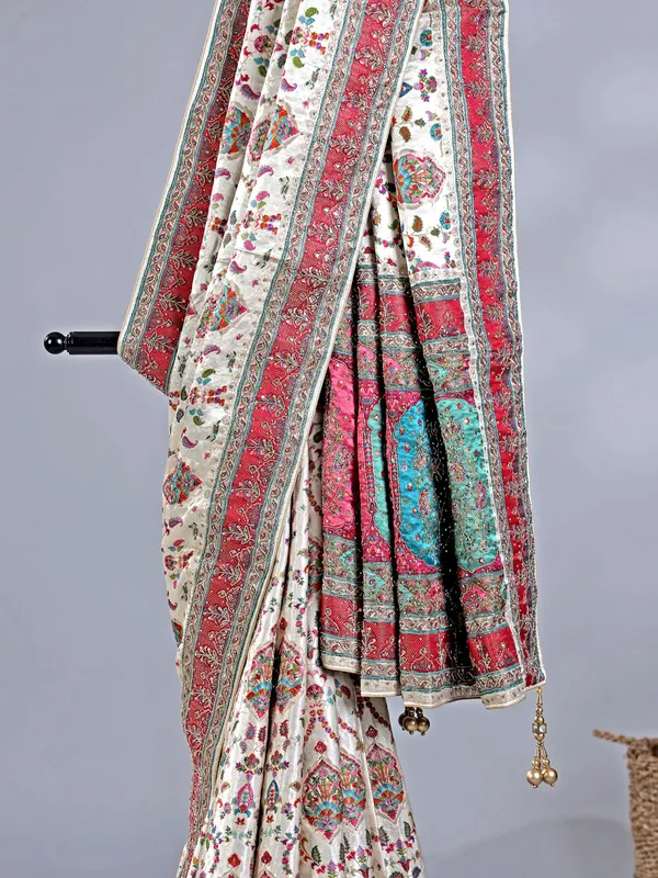 Off white zari weaving wedding wear saree
