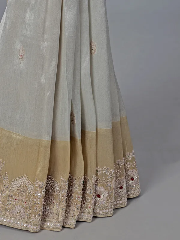 Off white ziraf silk saree with heavy border