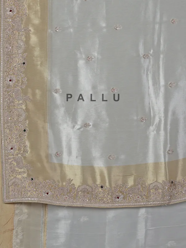 Off white ziraf silk saree with heavy border