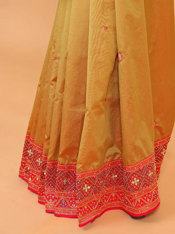 Olive art silk saree with contrast border and pallu