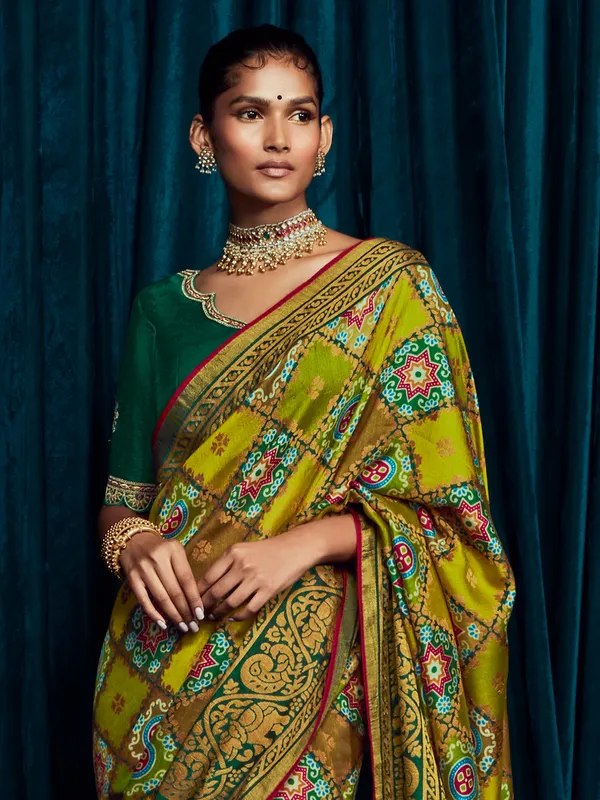 Olive brasso silk zari woven saree