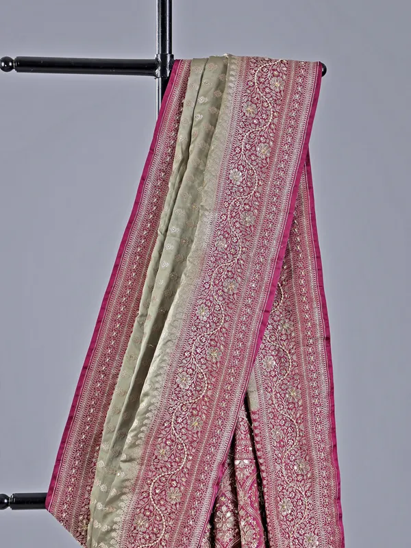 Olive embellished silk saree for wedding wear