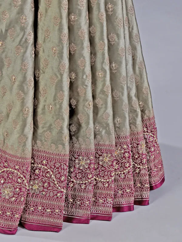 Olive embellished silk saree for wedding wear