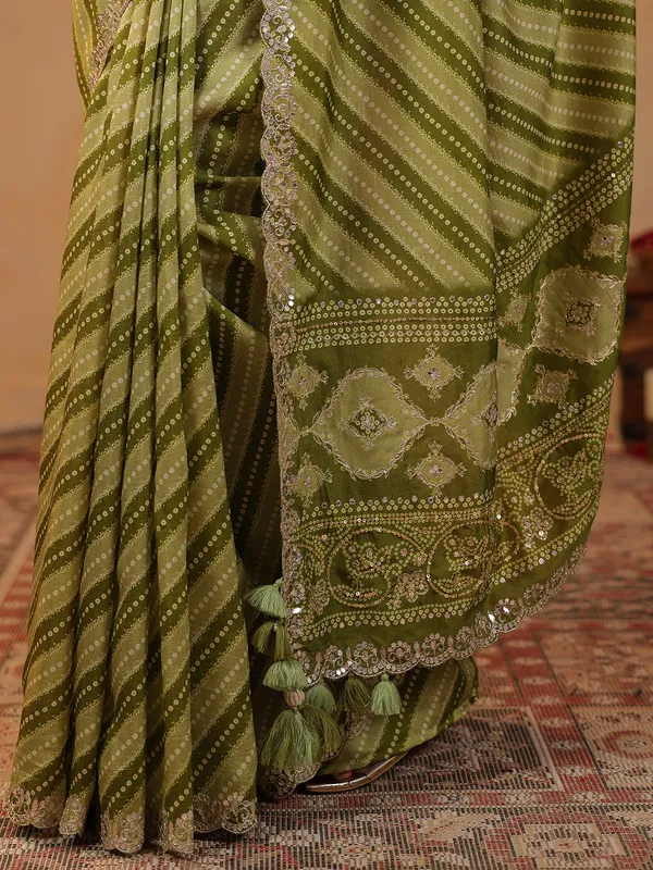 Olive printed silk saree with gota embellishment