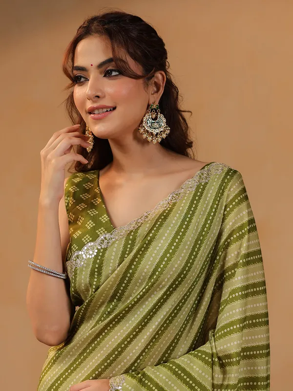 Olive printed silk saree with gota embellishment