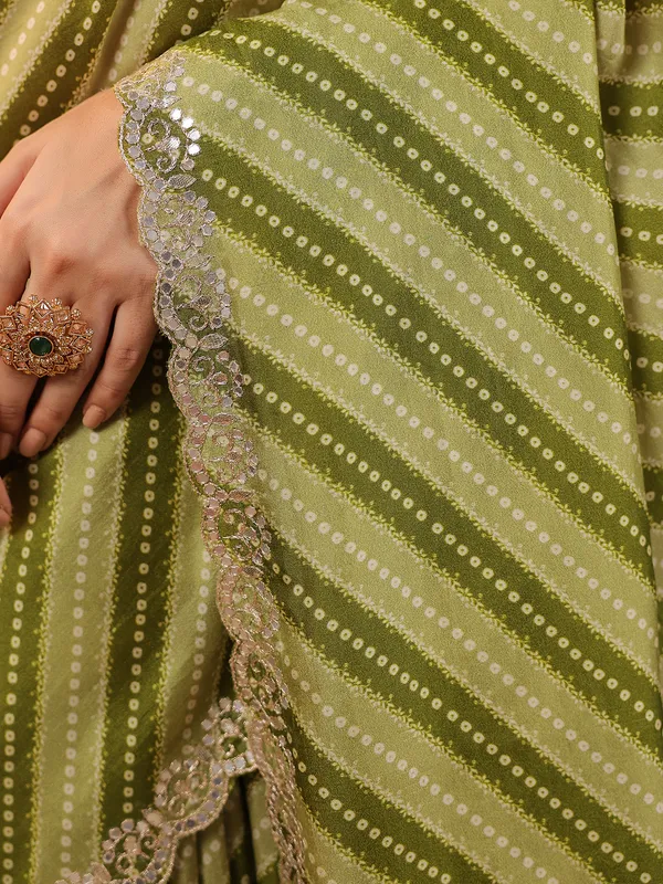 Olive printed silk saree with gota embellishment
