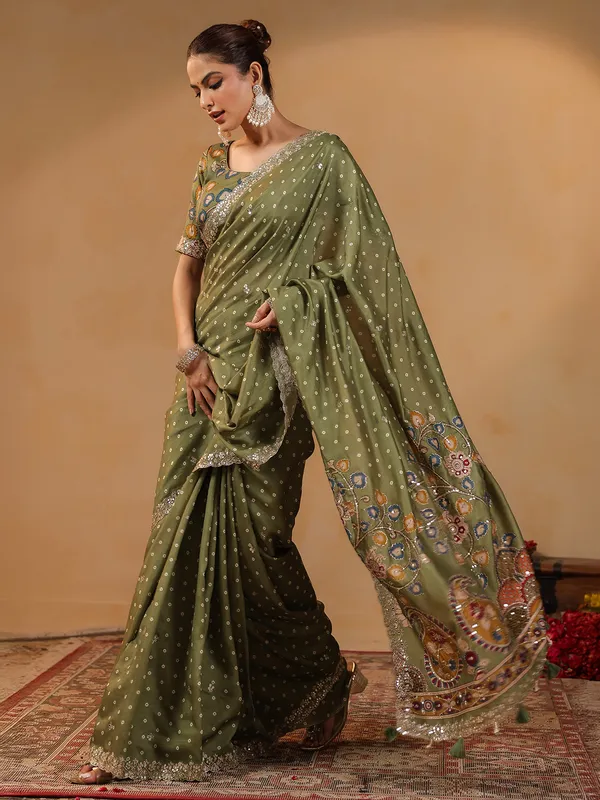 Olive printed silk saree with resham touches