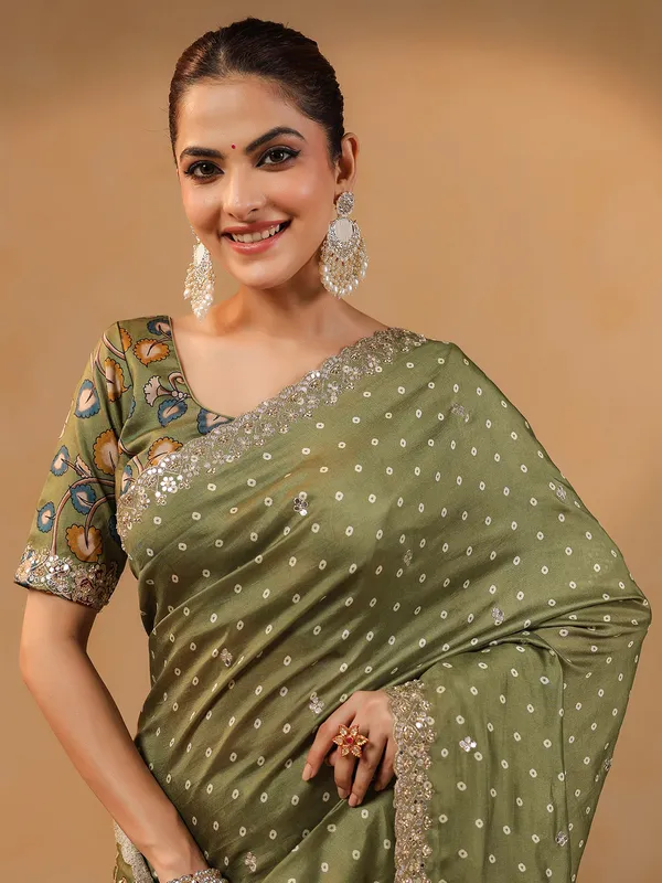 Olive printed silk saree with resham touches
