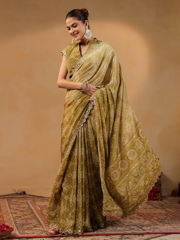 Olive printed silk saree with sequins and aabla shimmer