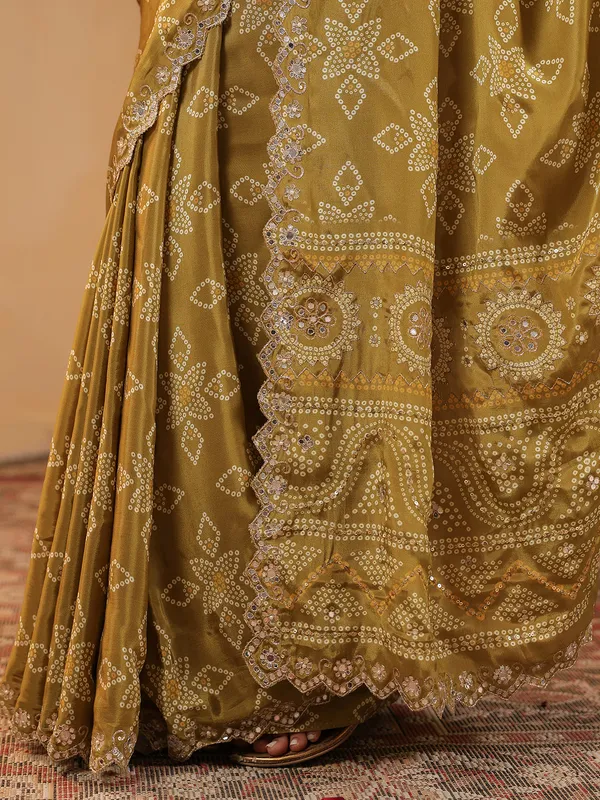Olive printed silk saree with sequins and aabla shimmer