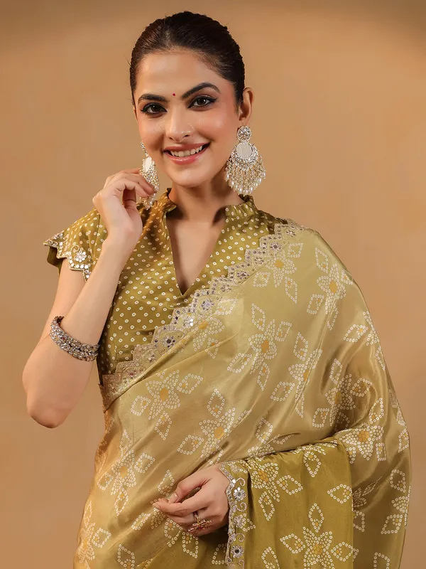 Olive printed silk saree with sequins and aabla shimmer