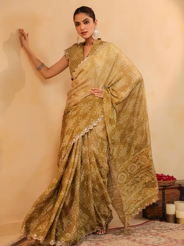 Olive printed silk saree with sequins and aabla shimmer