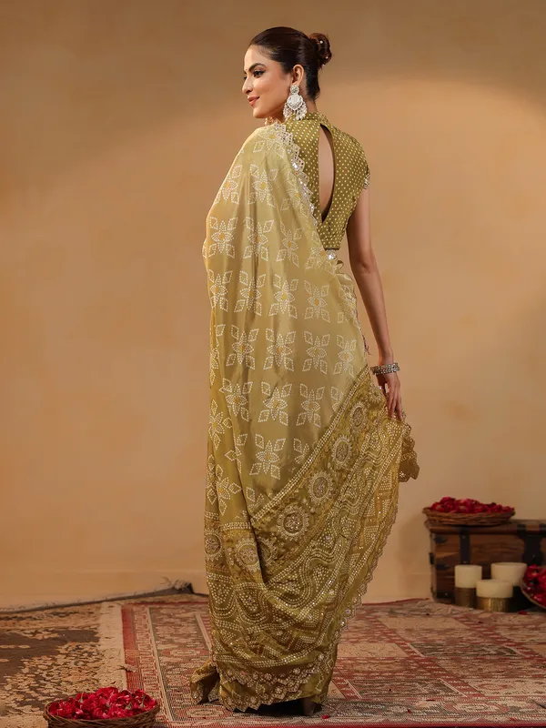 Olive printed silk saree with sequins and aabla shimmer
