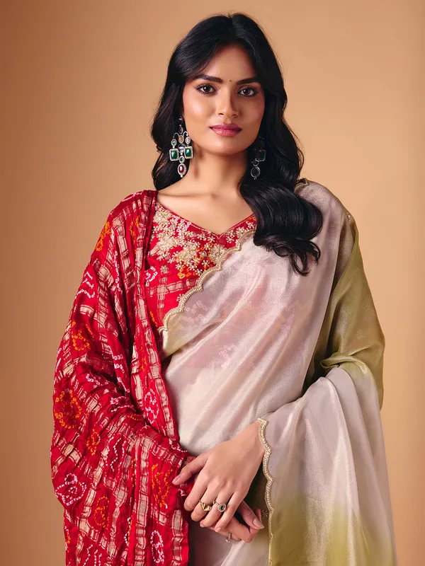 Olive shaded tissue silk saree with dupatta