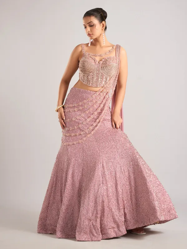 Onion pink net designer lehenga choli attetched with dupatta