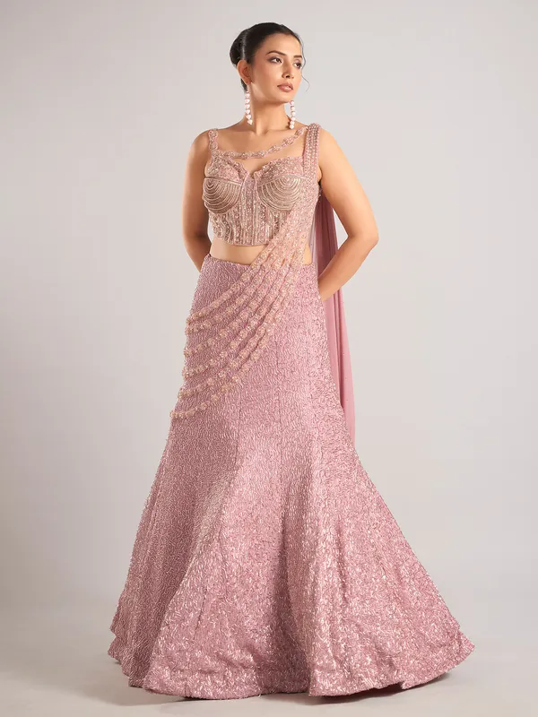 Onion pink net designer lehenga choli attetched with dupatta