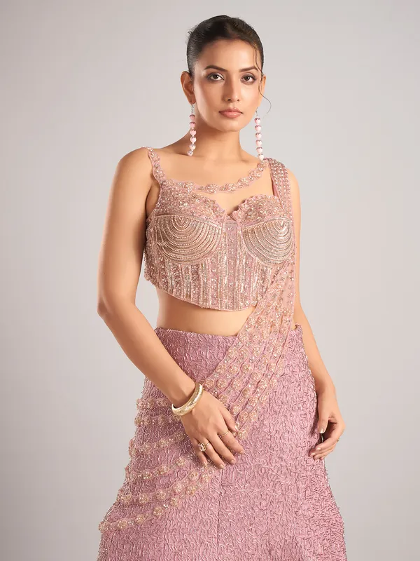 Onion pink net designer lehenga choli attetched with dupatta
