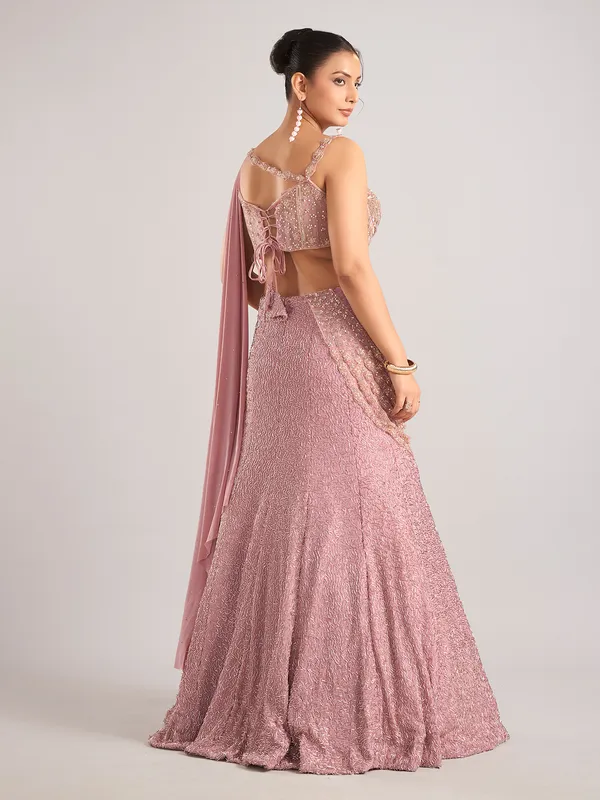Onion pink net designer lehenga choli attetched with dupatta