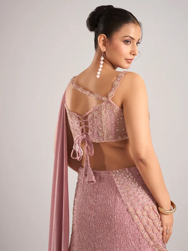 Onion pink net designer lehenga choli attetched with dupatta