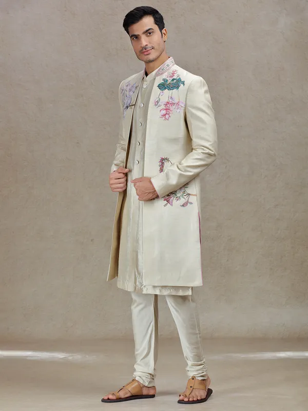 Opulent beige indowestern for a majestic look
