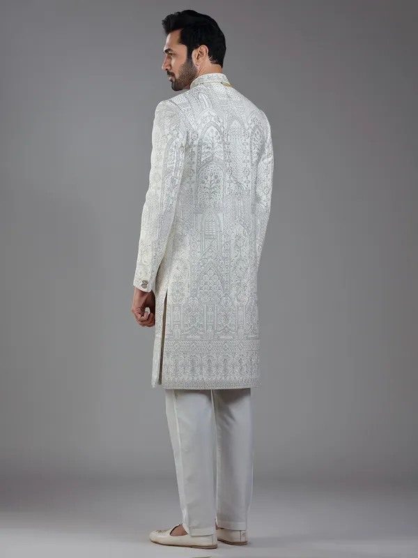 Opulent elegance in cream silk with artistic embroidery and resham
