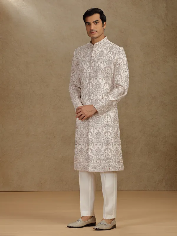 Opulent gold silk sherwani for wedding occasions