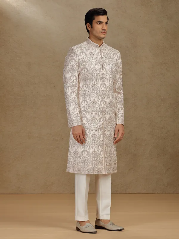 Opulent gold silk sherwani for wedding occasions