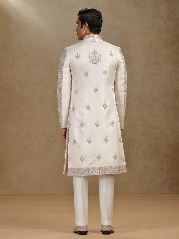 Opulent gold silk sherwani for wedding occasions