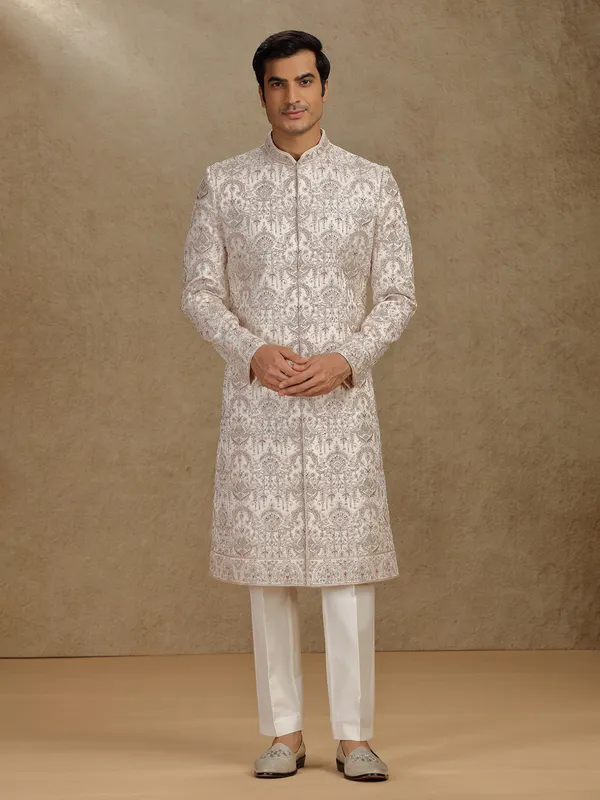 Opulent gold silk sherwani for wedding occasions