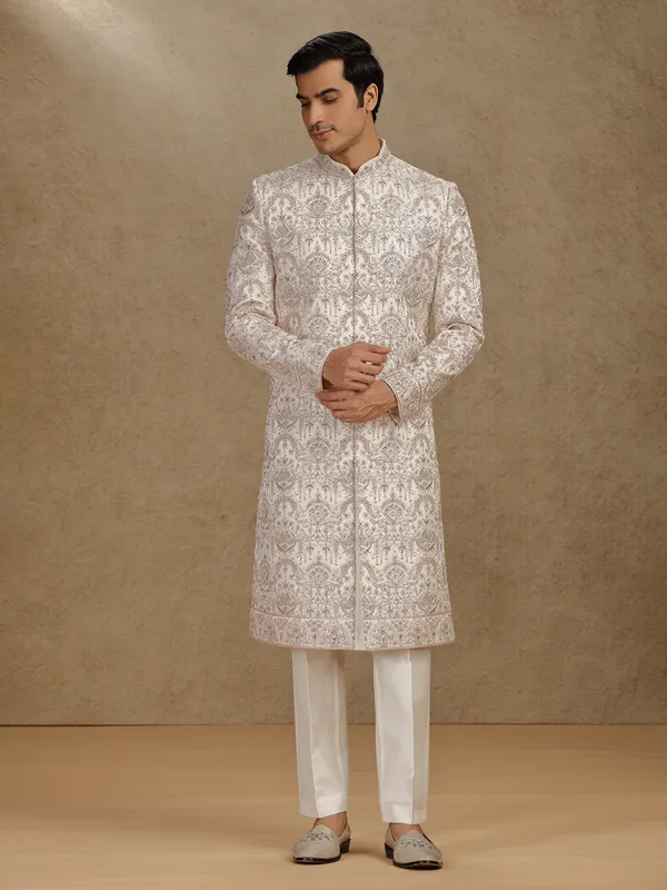 Opulent gold silk sherwani for wedding occasions