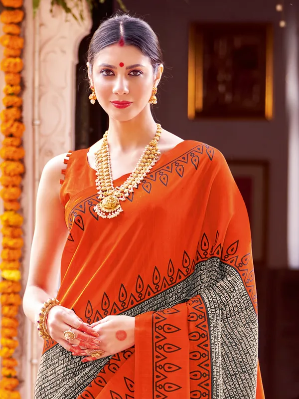 Orange and black printed bhagalpuri silk saree
