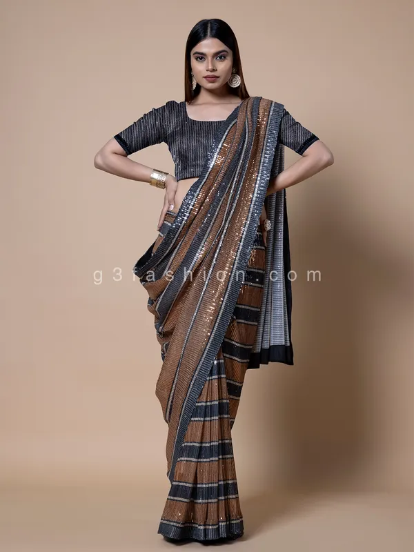 Orange and black stripe pattern sequins saree
