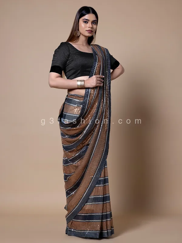 Orange and black stripe pattern sequins saree