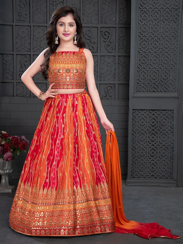 Orange and red printed silk lehenga choli