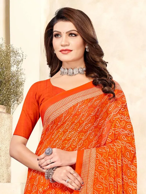 Orange bandhani printed chiffon saree