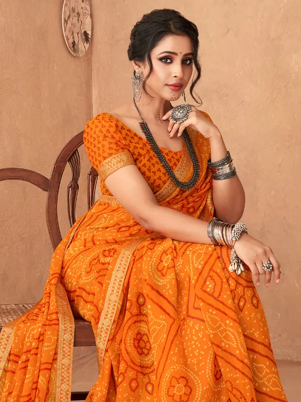 Orange bandhani printed saree in chiffon
