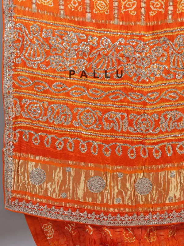 Orange bandhani saree with beaded detailing