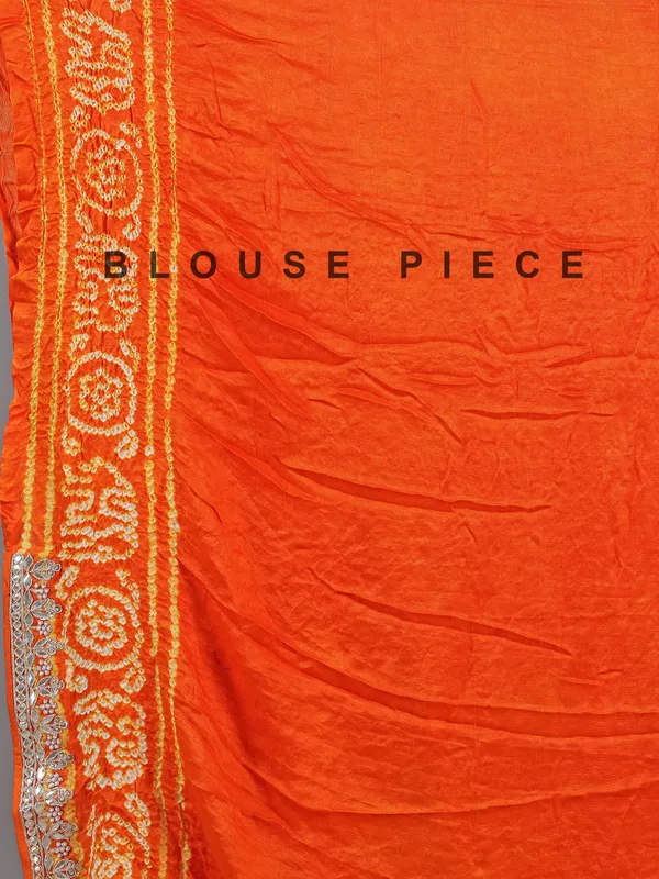 Orange bandhani saree with beaded detailing