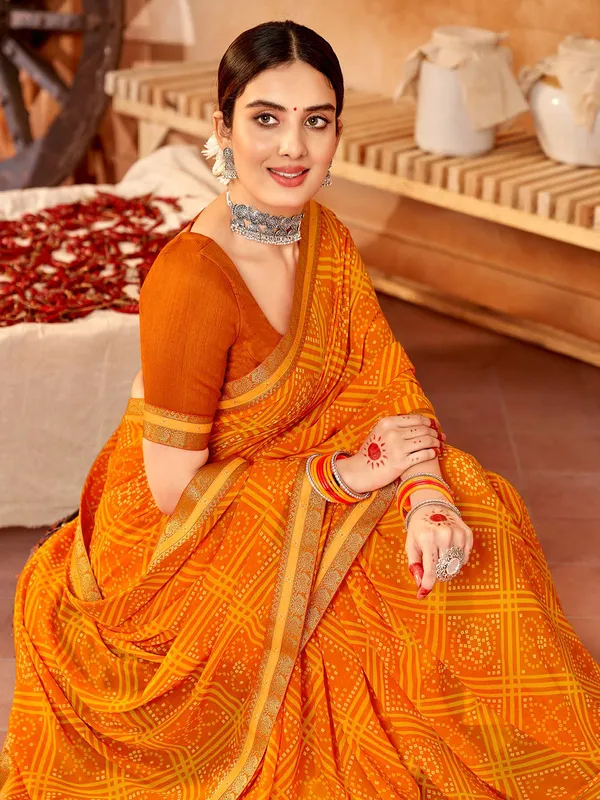 Orange bandhej printed saree