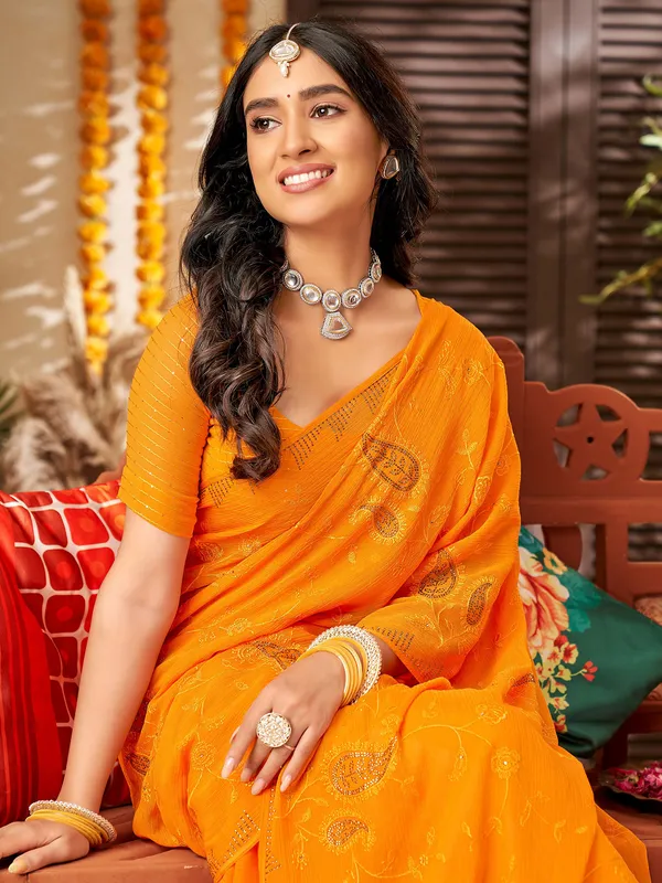 Orange chiffon saree with embroidery