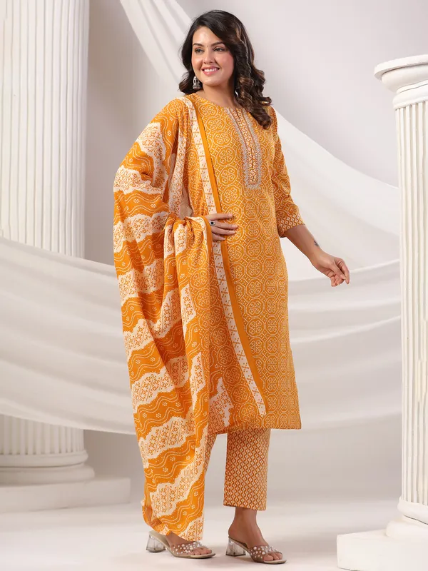 Orange color silk kurti set in printed