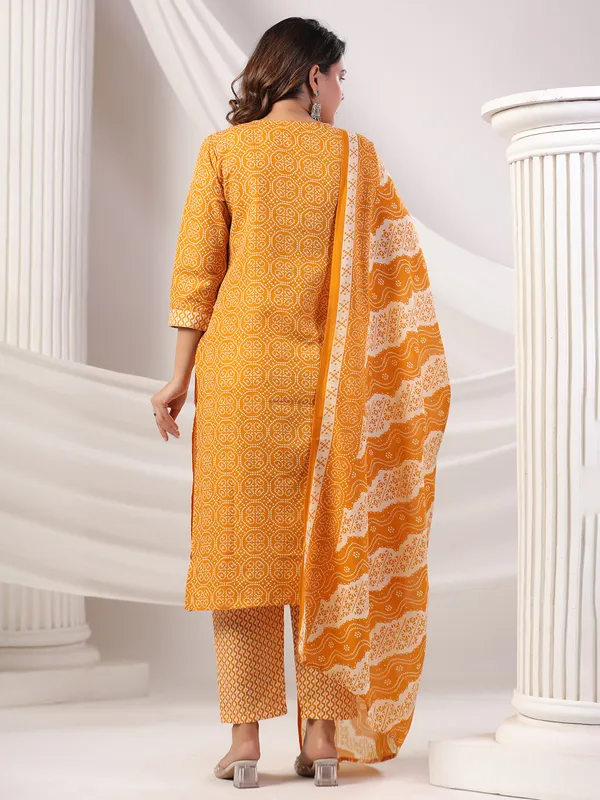 Orange color silk kurti set in printed