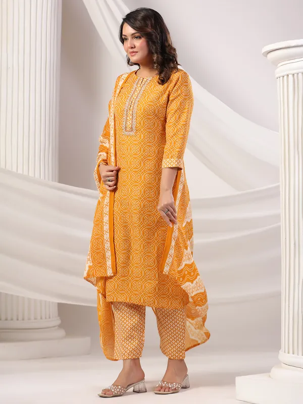 Orange color silk kurti set in printed
