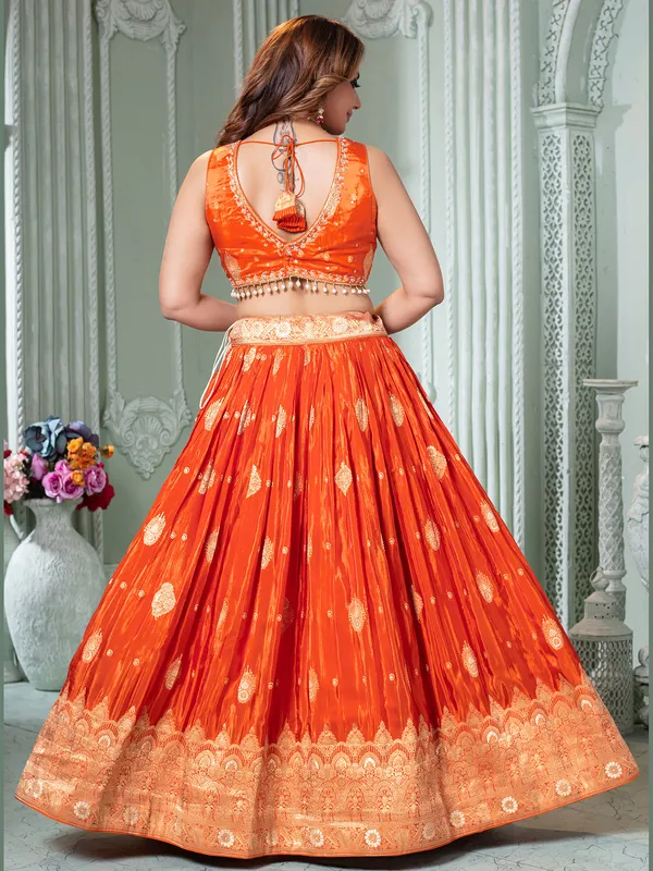 Orange crepe silk lehenga choli for occasions